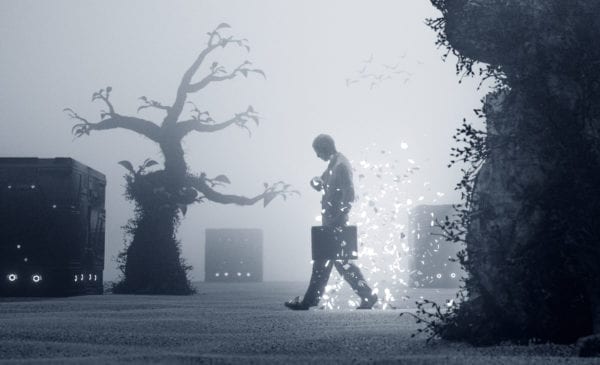 Businessman walking in surreal desert